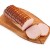 Ein gebackener Leberkäse auf einem Brett