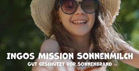 INGOs Mission Sonnenmilch, gut geschützt vor Sonnenbrand! Mädchen mit Sonnenbrille und Hut