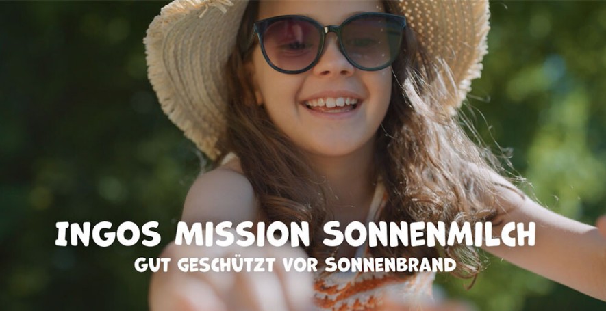 INGOs Mission Sonnenmilch, gut geschützt vor Sonnenbrand! Mädchen mit Sonnenbrille und Hut