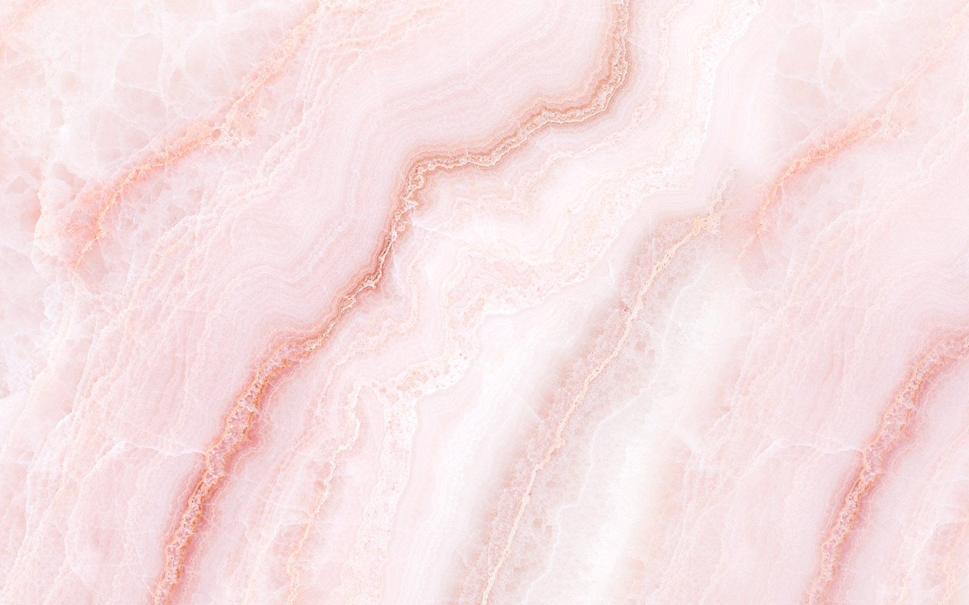 Abstrakte Naturstein-Textur in Weiß und warmen Rosa-Pink-Tönen erinnert an Onyx- oder Calacatta-Marmor