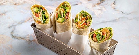 Vier Wraps aufgestellt in einer rechteckigen Form