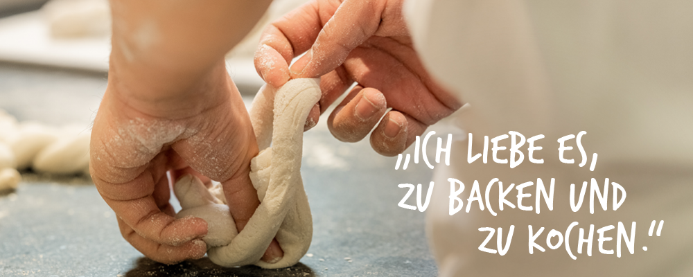 Lehre-Sujet mit der Aufschrift: "Ich lieb es, zu backen und zu kochen"