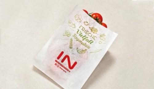 INTERSPAR Papiertüte gefüllt mit Tomaten