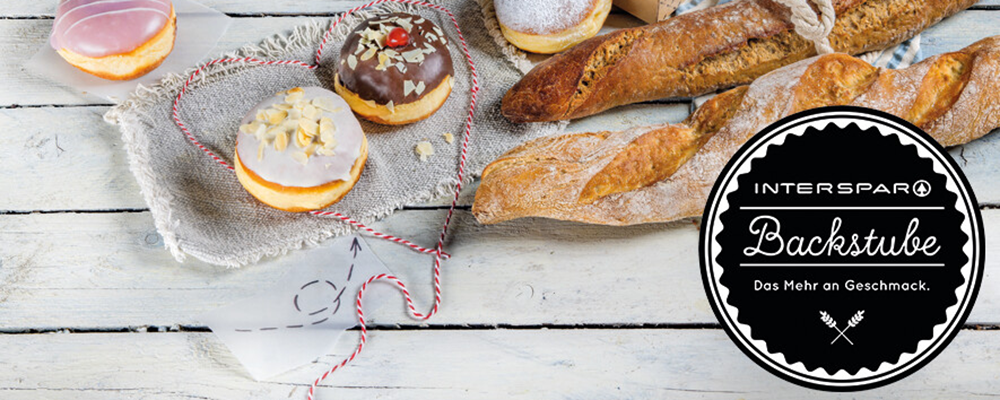 Baguettes und Krapfen und das INTERSPAR Backstube-Logo